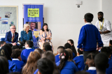 The Queen unveils 50th Coronation Library at Moreland Primary School in London